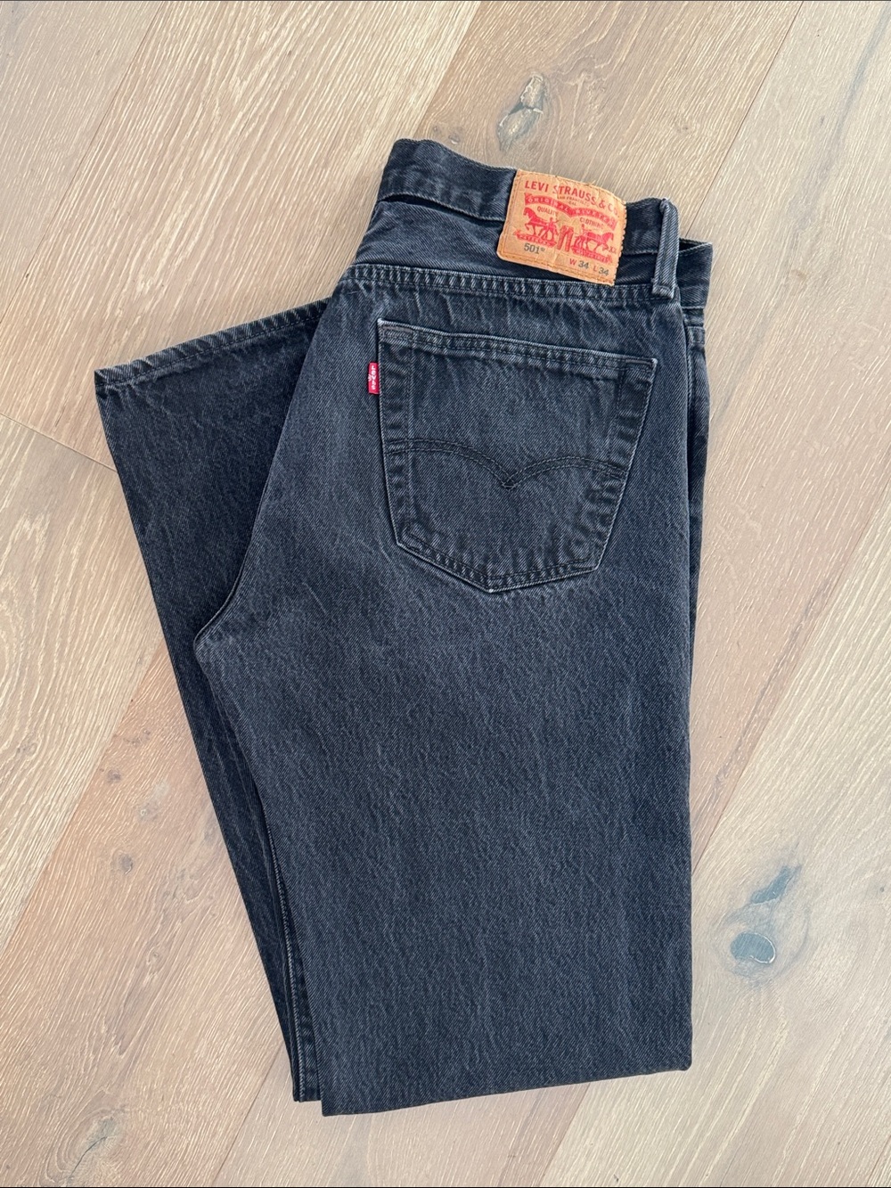 vintage levi’s 501 34 x 34 washed black denim button fly